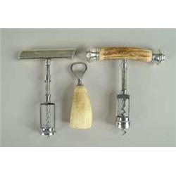 TWO CORKSCREWS AND ONE BOTTLE OPENER