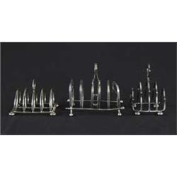 THREE SILVER TOAST RACKS