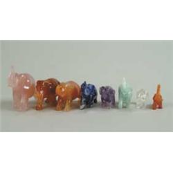 LOT OF EIGHT STONE ELEPHANTS