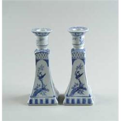 PAIR OF BLUE AND WHITE PORCELAIN CANDLESTICKS