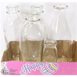 LOT OF 4 QUART AND 1 HALF PINT GLASS MILK BOTTLES