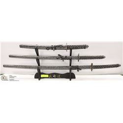 3 JAPANESE DAGGERS WITH STAND