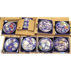 STACK OF EIGHT CHINA COLLECTOR PLATES