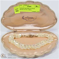 ANTIQUE MOTHER OF PEARL NECKLACE IN A SHELL