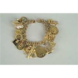 YELLOW 14KT GOLD CHARM BRACELET