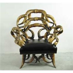 OUTSTANDING LARGE AMERICAN STEER HORN ARMCHAIR WITH FOOTSTOOL