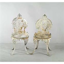 PAIR OF CAST IRON GARDEN CHAIRS