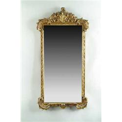 CARVED WOOD AND GESSO DECORATED WALL MIRROR