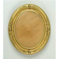 PAIR OF GILT GESSO DECORATED OVAL FRAMES