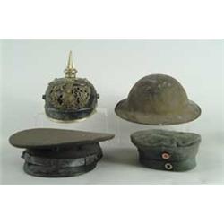 LOT OF WWI AND WWII UNIFORMS AND HELMETS