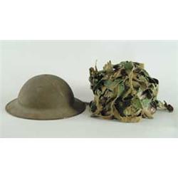 TWO MILITARY HELMETS