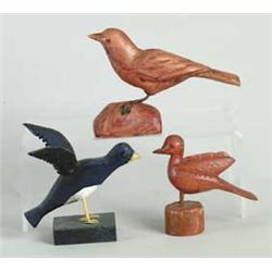 THREE CARVED WOOD BIRDS