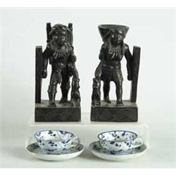PAIR OF CARVED WOOD FIGURES AND PAIR OF ORIENTAL CUPS AND SAUCERS