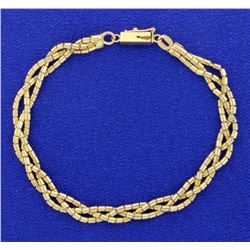 6 3/4 Inch Braided Gold Bracelet