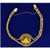 Image 2 : 1/10 Ounce Gold Chinese Panda Coin in Bracelet