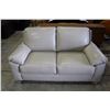 Image 1 : CREAM COLOURED LEATHER LOVE SEAT