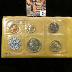 1963 P U.S. Proof Set, Dime is toned, otherwise in original packaging as issued.