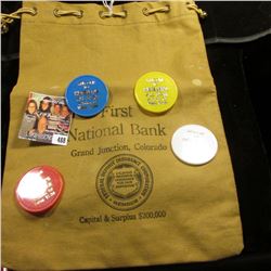 (4) different colored "Welcome/To/Hetzler's/All Star/A Token of/Value $1.00" Chips; & a draw string 