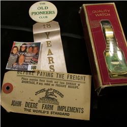 A few John Deere items: "Quality Watch" new in box, may need battery; Pin-back with ribbon "The Old 