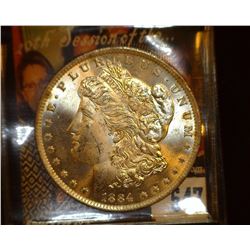 1884 O  Morgan Silver Dollar, Brilliant Uncirculated.
