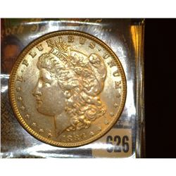 1886 P Morgan Silver Dollar, Almost Uncirculated.