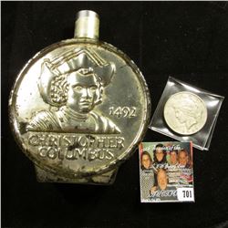 "1492 Christopher Columbus" Bottle dated 1976 on the base; & 1922 P U.S. Peace Silver Dollar, VF.