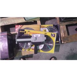 Three packages of unused 71/4" saw blades, & one gun