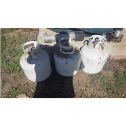 Three 20 LB propane tanks
