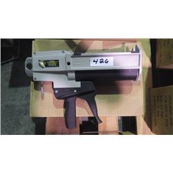New unused Two compartment adhesive gun