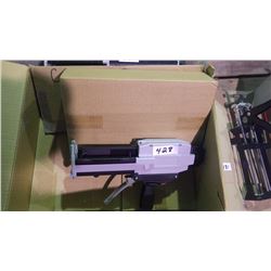 New unused Two compartment adhesive gun
