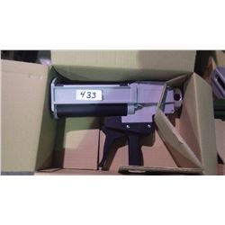 New unused Two compartment adhesive gun