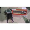 Image 1 : Two unused caulking guns