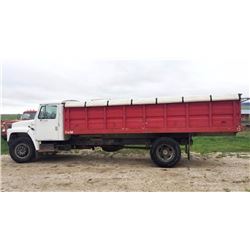 1979 IH 2-ton, CAT diesel, 5/2 spd., 2-way hoist, duals, 20' box, 40" sides, wood floor, roll tarp,