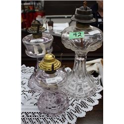 3 Oil Lamps - No Chimneys - 1 is Finger Lamp (turning purple) - 2 have cracks