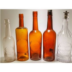 Five Western Whiskey Bottles