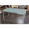Image 1 : GLASS AND CHROME MODERN DINING TABLE