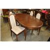 Image 1 : WALNUT DINING TABLE WITH TWO LEAFS AND FOUR UPOLSTERED CHAIRS