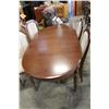Image 2 : WALNUT DINING TABLE WITH TWO LEAFS AND FOUR UPOLSTERED CHAIRS