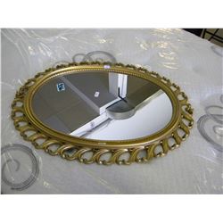 OVAL FRAMED MIRROR