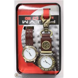 A PAIR OF NEW GOLF WATCHES IN A TIN CASE
