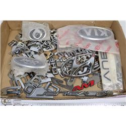 LOT OF NEW/USED CAR/TRUCK EMBLEMS