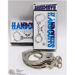 LOT OF 2 PAIRS OF HANDCUFFS