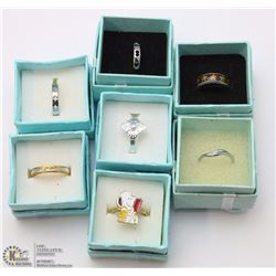 7 FASHION RINGS IN RING BOXES
