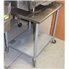 Image 1 : 2 TIER STAINLESS STEEL PREP TABLE ON CASTORS