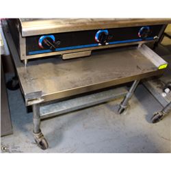 STAINLESS STEEL 2-TIER PREP TABLE ON CASTORS