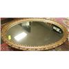 Image 1 : LARGE GOLD TONE FRAMED OVAL MIRROR