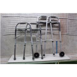 Pair of Collapsible Walkers (One With Wheels, One Without)