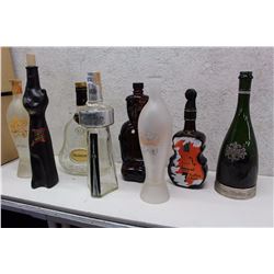 Lot of Assorted Liquor Bottles (8)(Orchid, Hennessy, CN Tower Canadian Whisky, etc;)