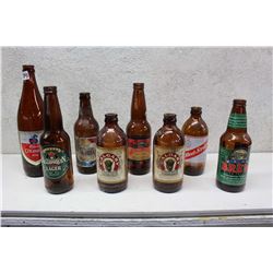 Lot of Assorted Liquor Bottles (8)(Molson Canadian, Calgary Beer, Algonquin Lager, etc;)