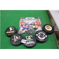 Lot Of Logo Hockey Pucks